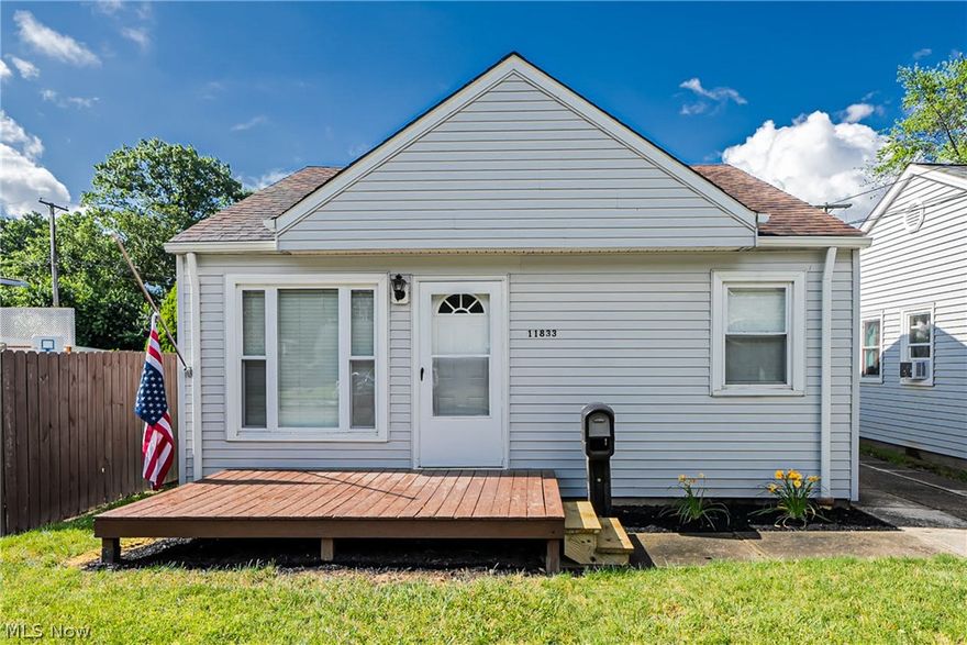 Welcome to 11833 Milligan Avenue, Cleveland, OH! This beautifully renovated two-bedroom, one-bathroom home is a perfect blend of modern style and comfort. Step into a fully renovated kitchen that boasts a sleek concrete slab countertop, brand new cabinets, stylish fixtures, and top-of-the-line appliances, making it a chef's dream. The entire house features new luxury vinyl plank (LVP) flooring, offering both durability and a contemporary look. The bathroom has been meticulously remodeled with elegant tile work, adding a touch of luxury to your daily routine. Additionally, this home is equipped with a new roof, furnace, air conditioner, and hot water tank, ensuring peace of mind and efficiency. Add on a fully fenced in yard and what more could you want? Don't miss out on the opportunity to own this move-in ready gem in a desirable Cleveland neighborhood. Make your appointment today!