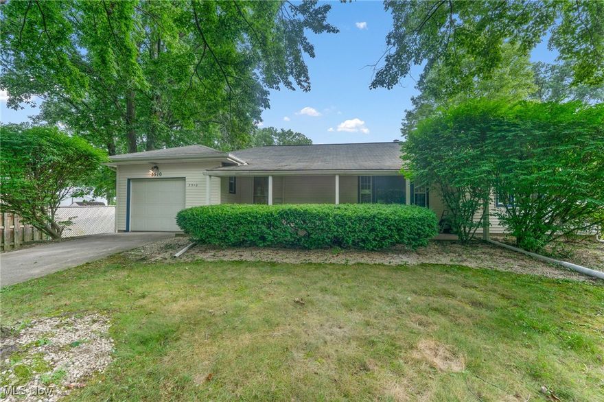 Don’t miss this completely remodeled 3 bedroom, 2 bath ranch in Howland Township, ready for you to call home! Nestled on a serene, well-maintained block, the covered front porch leads to a welcoming entry that opens into the living room, where plush new carpet, a warm fireplace, and energy-efficient vinyl windows create a cozy retreat. The spacious kitchen features brand-new white cabinetry, quartz countertops, a subway backsplash, stainless sink, and a shiplap accent wall, plus plenty of room for an island. An informal dining nook at the rear of the kitchen opens to the back yard, perfect for indoor-outdoor entertaining. All three main-level bedrooms offer generous closet space and new carpet; one even offers main-floor laundry hookups for add-on convenience. The full bath boasts porcelain-tile tub surround, vinyl plank flooring, a modern vanity, and a sleek new toilet. The finished lower level with a cedar-lined closet, half-bath with separate private shower, storage room, and walk-out basement is perfect for entertaining and enjoying your bar area. Updates include vinyl siding, a 100-amp electrical panel, new HVAC, and a hot water heater. Located in the top-rated Howland Local School District. This home is a true find. Schedule your personal tour and see why this home truly feels like home