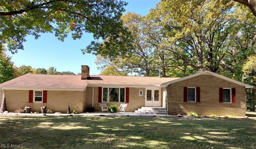 7.29 acres with 300' frontage. Firelands School district! Easy access to Rt. 2 and Rt. 80/90. Remodeled ranch. Kitchen has granite countertops with full granite backsplash and Blanco composite granite sink. Pergo floors through kitchen and laundry area. Completely remodeled master bath with large 5' shower and separate tub. Second full bathroom also completely remodeled and both bathrooms have granite countertops. Newer carpet in all three upstairs bedrooms. New vinyl plank flooring in basement bedroom. The attached garage is 21'9" x 24' with an epoxy floor. The detached garage is 24'x28' and has an overhead loft to store extra items. The barn is 30'x30' 2 story. The basement is nicely finished. There are 2 water taps on this property. Two septic tanks are on the property - one is at the barn. A fully stocked 1/3 acre pond sits in the back. Approximately 2 acres of woods to use. The front ditch has been filled for easier yard maintenance. Plenty of room for farm animals. There are many