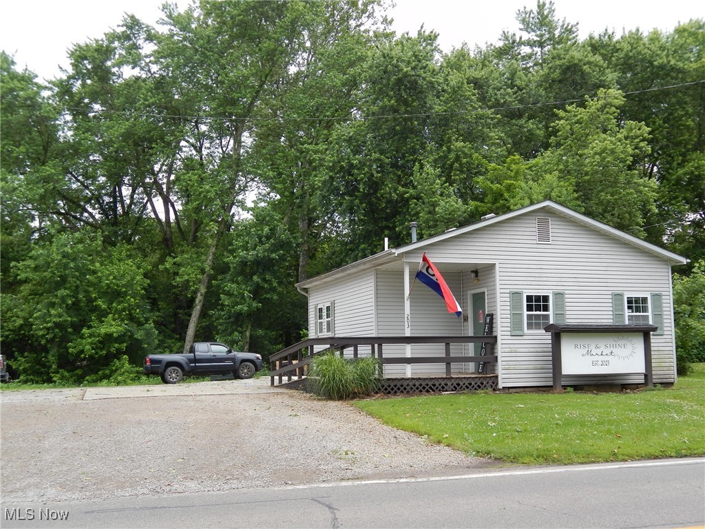 Endless Possibilities in the Heart of Warsaw! This versatile 624 sq. ft. property most recently operated as a meat and vegetable market but could easily be transformed into a cozy 1-bedroom residence—or used to launch your next business venture! Features include a kitchenette with a commercial sink and separate handwashing sink, a handicap-accessible half bath (no tub or shower), and a bedroom with closet. Additional highlights: updated electric and plumbing, handicap-accessible ramp, walk-out basement, concrete parking area, forced air gas furnace (2020), central air, and new windows. Zoned General Business or Residential. Beautiful river setting behind the property—not in a flood plain. Located at 135 W Main St. (also known as 203 W Main St.), Warsaw. So many opportunities await! *Store fixtures do not convey with property, not selling the business, just the building*