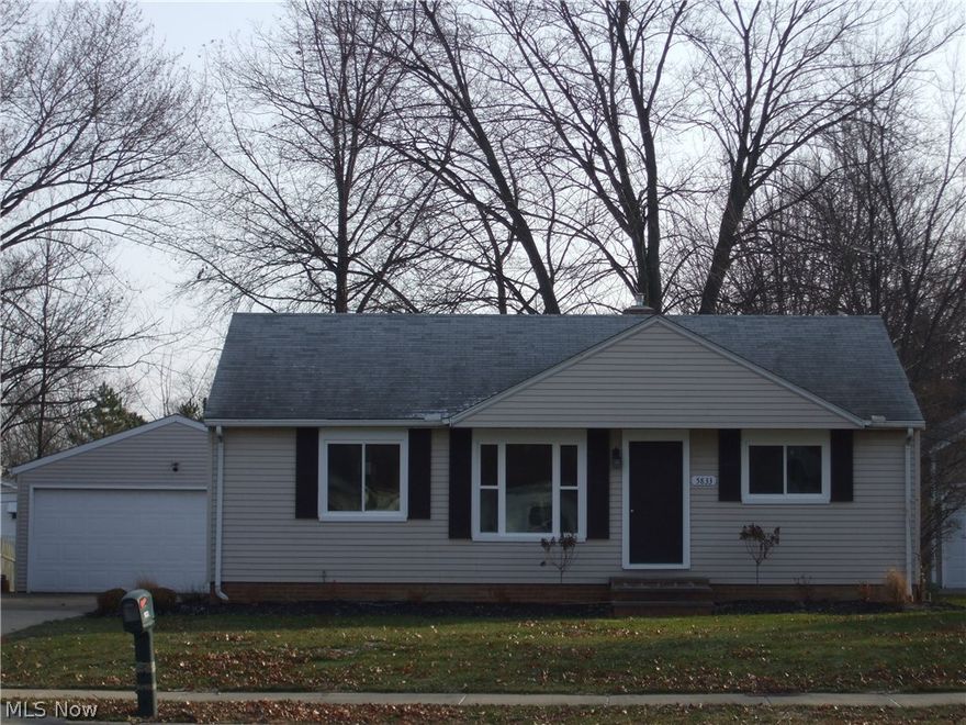 Reconstructed open concept Ranch on .58 acre in the city!  Totally new kitchen, cabinets, counter tops with glass back splash, unique tile flooring, all new stainless steel appliances and light fixtures.  You'll enjoy cooking and spending time in this gorgeous kitchen and being able to be a part of the happenings in the living room at the same time!  Living room is spacious and open to the kitchen, with new carpet and a new front entrance door and large picture window.  Entirely new bathroom with new vanity, mirror, lighting, commode, tub & shower with sharp tile surround to match the floor! Master bedroom has a large closet and along with the 2 other bedrooms has new carpeting and overhead lights.  The home has lots of windows that bring in lots of natural light.  Huge room in the basement with new carpeting, paint and ceiling, ready to be a family room, play room, or man cave!  All new windows, new furnace, hot water tank and 100 AMP service all up to code. Nice 2 car garage and supe