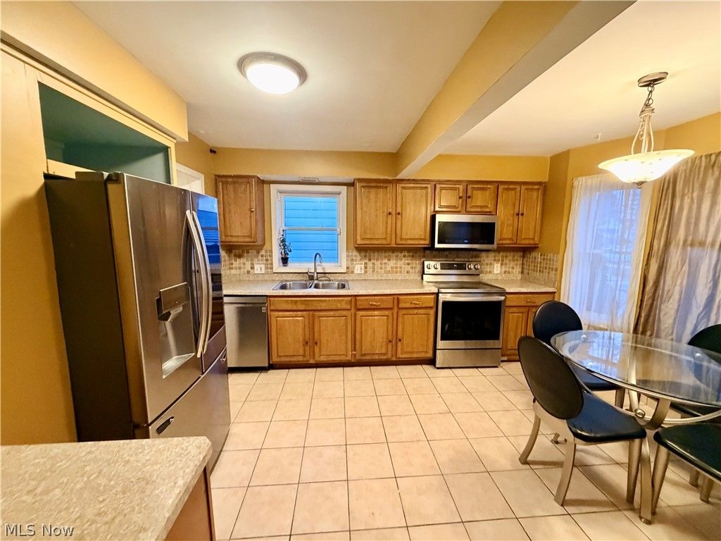 Photo of 5212 E 105 Street, Garfield Heights, OH 44125 (MLS # 5189201)