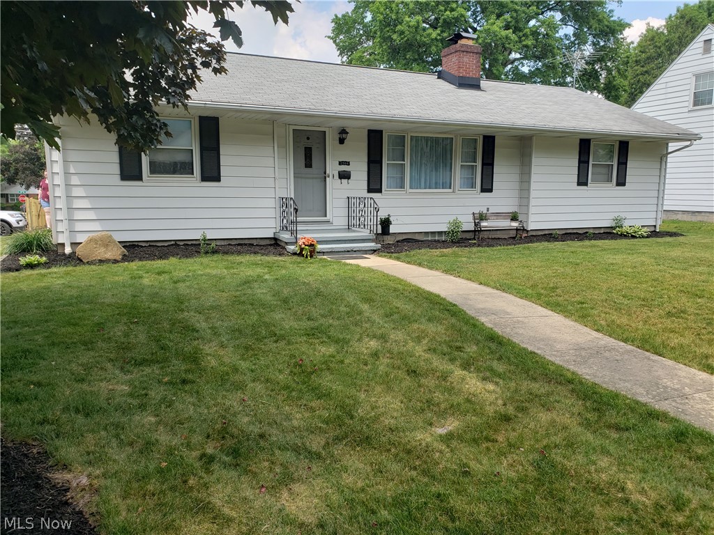 Welcome home to this darling ranch with 2 bedrooms, living room, family room, *BONUS* room and partially finished basement! WOW!! Single floor living! Enjoy a huge 2.5 car garage with plenty of parking! The gas fireplace is perfect for chilly nights and the back patio is perfect for summer cookouts and entertaining! Gorgeous, colorful hibiscus planted around the home are just coming in bloom! Plenty of storage! Newer A/C unit! Waterproofed basement too! Perfect location close to shopping, dining, schools and parks!