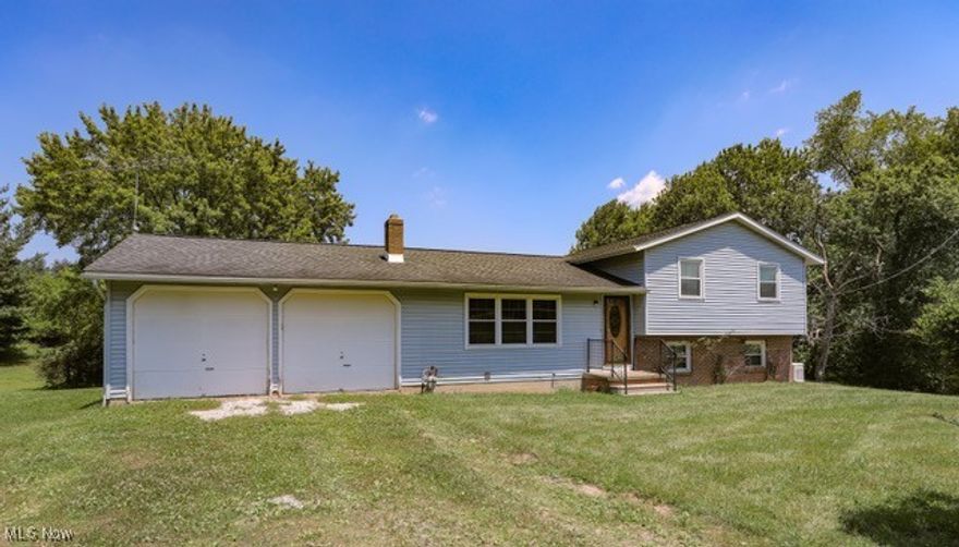 Situated on 5 park like acres in Franklin Twp. Is this 1,804 sq. ft. Split-level home with 3 bedrooms, 2 bathrooms, eat-in kitchen with stainless-steel refrigerator and stove, dining room off the kitchen, spacious formal living room, and a cozy family room with wood-burning fireplace in the lower level. There is also an office that could be potential recreation room, partial basement, two car attached garage, nice size rear deck, smokehouse, and a 40 ft. x 60 ft. barn with its own electric panel, furnace, and a/c. Additionally, there is a newer Generac generator and Carrier furnace (approx. 2 yrs). Minutes to all major highways, and the Turnpike. This home just needs a little paint and carpet and is ready to go! Schedule your showing before this one is gone!