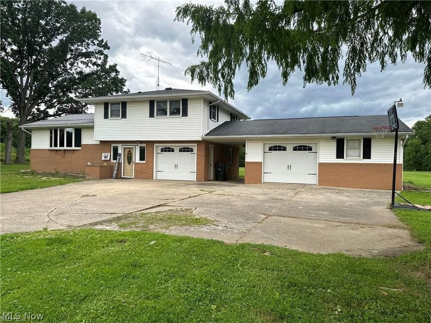 Exciting news! An amazing home in Alliance, OH is now available! This fantastic 4-bedroom, 3-bath home offers 2,088 sq ft of stylish living space. Built in 1966, it features a cozy family room with a fireplace, a sunny 4-season room, and a kitchen that’s perfect for whipping up delicious meals. Imagine living on 4 acres of land with the potential for livestock and plenty of room to play! Plus, you’ll love the 3-car garage and central air conditioning. Located in the Marlington School District, this home is waiting for you to make it your own. Don’t wait—schedule your showing today!