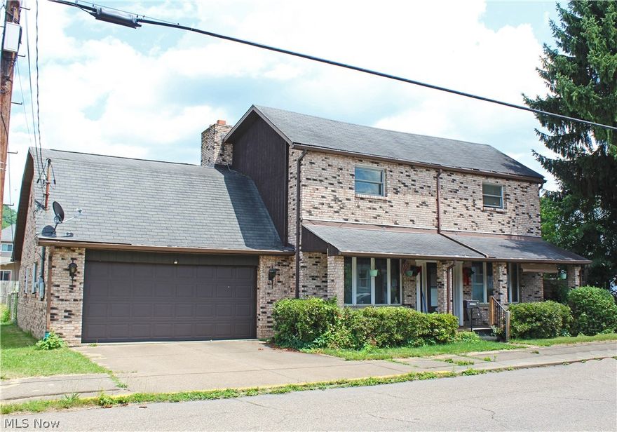 Welcome to your dream home in the heart of Wellsburg, WV! This stunning large brick residence offers 3 spacious bedroom and 3.5 bathrooms, providing ample space for all your needs. Bring your vision to sculpt this home into the home of your dreams! As you step inside, you'll be greeted by soaring high ceilings and an abundance of natural light that fills every room, creating a warm and inviting atmosphere. The open floor plan seamlessly connects the living, dining, and kitchen areas, making it perfect for entertaining guests or enjoying cozy family gatherings. The large kitchen features a breakfast bar with ample counter space, and cabinetry, making meal preparation a joy. Each bedroom is generously sized, with the primary suite boasting a large en-suite bathroom and a walk-in closet. Outside, the home sits on a level, fenced-in lot that offers endless possibilities. Whether you envision a lush garden, a play area for kids, or an outdoor entertainment space, this yard can accommodate it all. Located close to all the amenities Wellsburg has to offer, you'll have easy access to shopping, dining, and recreational activities, making this home not only a beautiful place to live but also incredibly convenient. Don't miss the opportunity to make this exceptional property your own. Schedule a showing today and experience the perfect blend of elegance, comfort, and potential that this home has to offer!