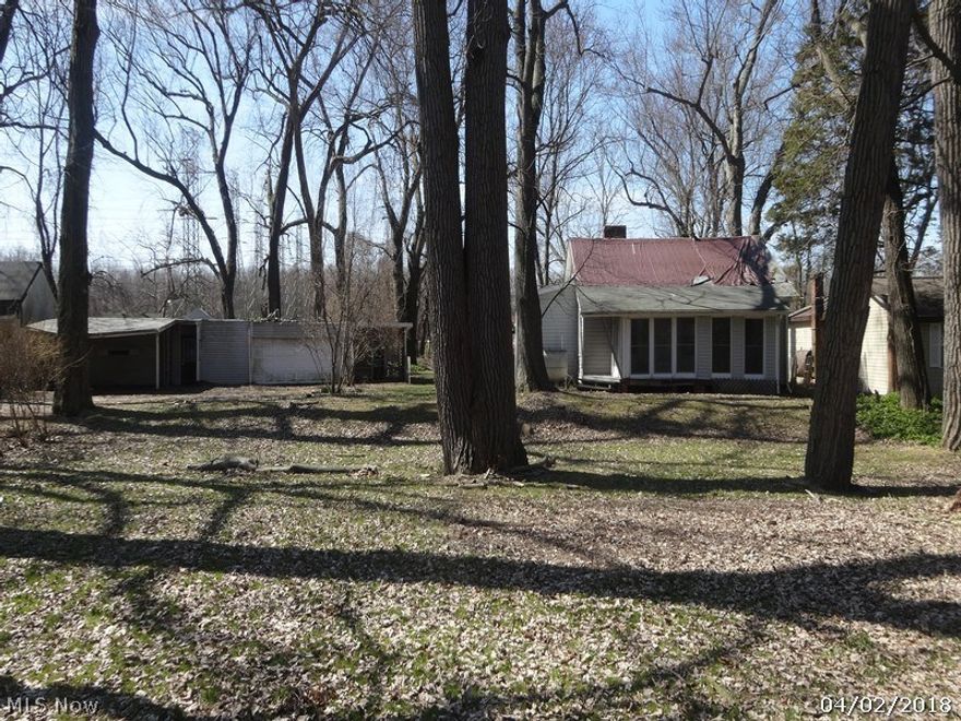 The Woodsy feel of this property would make Robinhood a merry man.  This cozy 1930 Bungalow has that cottage feel, but make no mistake it will take time and hard work to make this home sweet home. Home backs to Woodland Park. Bring your skills, and your brave and hardy workers. Opportunity awaits, call today! This property is a Freddie Mac/HomeSteps property being sold as-is. Seller will not make any repairs to the subject property, either lender or buyer requested. This property is eligible under the Freddie Mac First Look Initiative through 04/27/2018. POS and any repairs, if necessary are the responsibility of the Buyer.