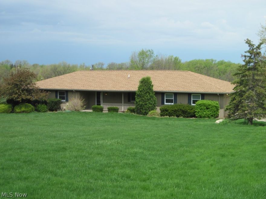 Welcome Home to this beautiful four bedroom ranch located in Highland School District, Hinckley, Ohio.  Situated on over 6 acres, this spacious ranch has much to offer.  The open floor plan from the kitchen to the eating area and family room make it perfect for entertaining.  Add to that, your own pool.  The multi-tiered maintenance free deck is absolutely huge and will make even the largest crowd comfortable.  A spectacular view makes it even more enjoyable to be outside for relaxing.  The main floor has three bedrooms and two and a half baths.  Another flexible room in the lower level can be used as a bedroom with the convenience of full bath on the lower level as well.  Daylight streams in the walkout sliding door.  Call today to schedule your own private showing.