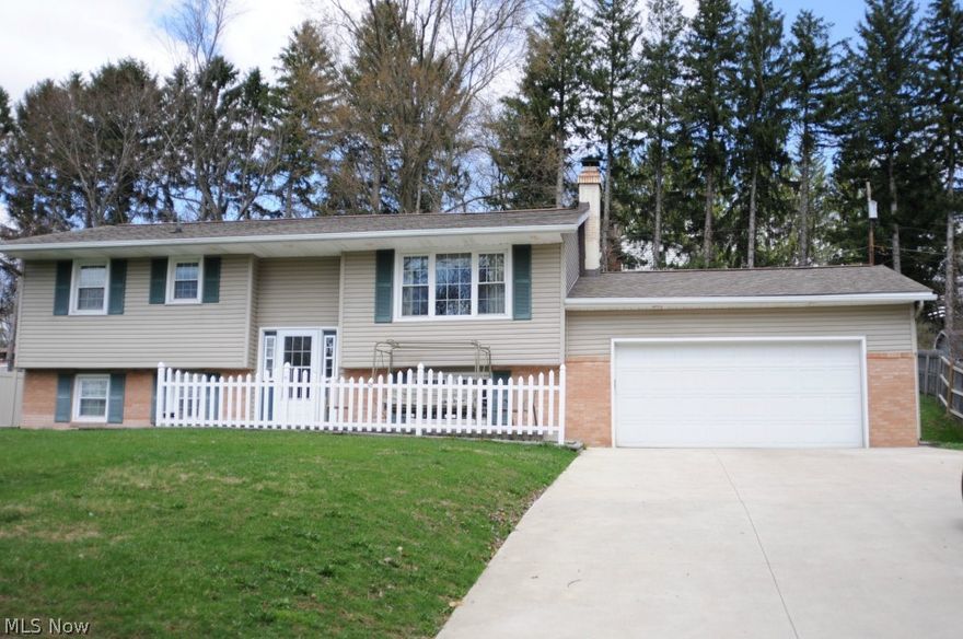 Spacious Bi-Level with 4 bedrooms, 2 full baths, family room with woodburning stove. Hardwood floor in livingroom and dining room, new carpet in family room and bedrooms. Newer concrete drive and front sidewalk & stoop, 200 AMP electric.