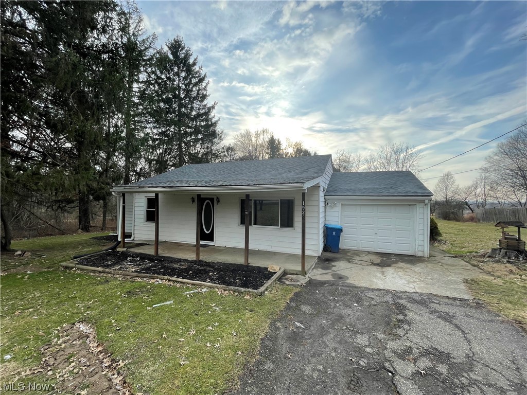 Welcome home to 1928 Turkeyfoot Lake Road in Coventry Twp! Property has a Barberton mailing address but it in Coventry Twp and Coventry LSD. New Roof just installed Feb 2024. This 3 bed, 2 full bath ranch is a must see, featuring a 1.7 acre lot, a potential fourth bedroom on the lower level, and updates throughout. Find your culinary inspiration in the beautifully remodeled kitchen boasting new granite countertops and cabinetry. The main level also offers new carpet and luxury vinyl plank/tile throughout. Venture down the hall to find your master suite along with the second bedroom and second full bathroom. Enter through a barn door to a stunning master bath addition featuring a double sink vanity, luxury vinyl, and large shower. The lower level has a laundry room and remodeled rec room that can be used as a fourth bedroom. A mud area sitting off the third bedroom leads to a deck overlooking the backyard. This home offers over 2,000 sq ft, lower level included. Don't hesitate to schedule your private viewing!