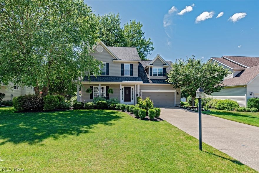 Move right in to your personal slice of paradise in this charming colonial on a quiet cul-de-sac street in Painesville Township! This picturesque home provides over 2,000 square feet of living space with a welcoming floorplan and a beautiful backyard. The front porch opens to an inviting living room. Durable vinyl flooring flows into the formal dining room. The kitchen includes all appliances, an island, and a sunny eat-in area that steps out to the back patio. Off of the kitchen, there is a mudroom and a half bathroom. Upstairs, you will find 4 bedrooms and 2 full bathrooms. The owner's suite includes a large bedroom, a walk-in closet with custom built ins, including a jewelry organizer, and an en-suite bath with two sinks, a jetted tub, and a step-in shower. All bedrooms have ample closets, plus, the fourth bedroom is oversized, perfect for use as a home office! The full lower level is partially finished with a nice rec room, plus there is plenty of space for storage and a laundry ar