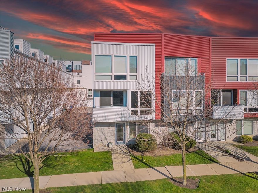 Spectacular townhome with stunning lake views through large corner windows, the huge rooftop deck, or the quaint terrace. Located within walking distance of Edgewater Beach, Gordon Square, Lindsey Family Play Space, and dozens of local eateries, bars, theaters, and art studios. You'll be drenched in natural light throughout the spacious layout that includes a bonus third bedroom, an open concept kitchen with corian countertops, bamboo flooring, and plush luxury carpet replaced in 2024. The primary bedroom includes a walk-in closet and a bonus custom closet unique to this home. Two of the three bedrooms are en-suite and a third half bath is conveniently located on the main floor. The attached garage tops of the wonderful features of this much loved and cared for home.