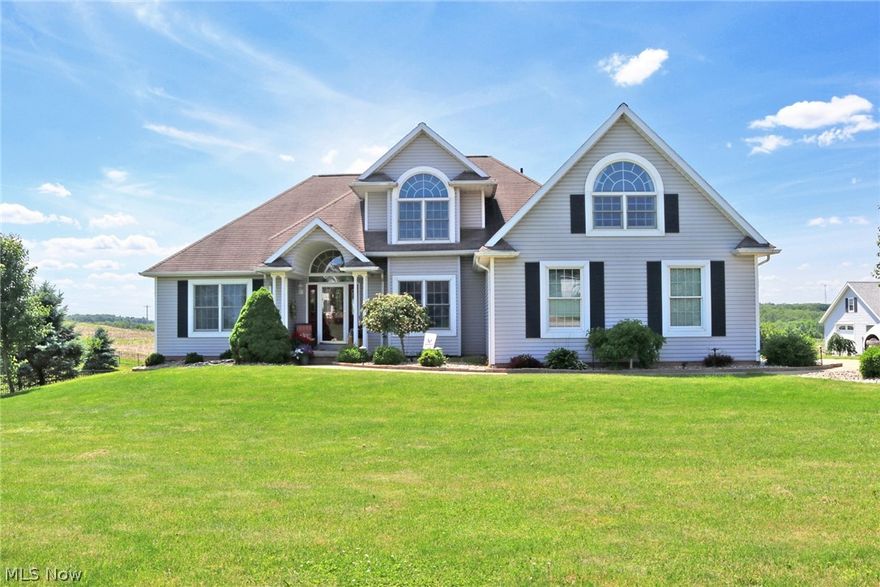 Enjoy the spectacular views from this 1.45 acre property. The home offers 3-4 bedrooms and 2.5 bathrooms, large 2nd floor bonus room. You will fall in love with the recently kitchen and master bath remodels. The kitchen features a large center island newer cabinets and countertops and appliances. The walkout basement leads to an aluminum design fenced yard. 40' Pro-Cell deck with a pergola and hot tub. Detached 24' x 20' garage/workshop wired for 220. Call for a private tour of this beautiful home.