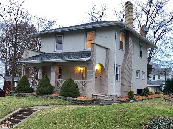 Ever dream of going to Harvard? Not the University silly, Harvard Ave. This stately 3 bedroom 1 1/2 bathroom colonial is all spiffed up and ready for its next chapter. Rich moldings, 9 ft tall ceilings and a wood burning fireplace greet you in the large living room. Dining room is large and in charge and ready for your family get togethers. Door off the dining room leads to a quaint patio. Kitchen has freshly painted cabinets, new counter tops, vinyl plank flooring and new SS appliances. Cozy dinette area is a great place to wake up and enjoy your morning coffee or perhaps some late night studying. Half bath on the main level is an added bonus. All spacious bedrooms are located on the second level and have ample closet space, fresh new carpet and beautiful hard wood floors. Full bath is mammoth!! Basement could easily be finished for added space. Does not have the typical "yucky old two-story basement". Stucco exterior has been freshly painted and the landscaping has been