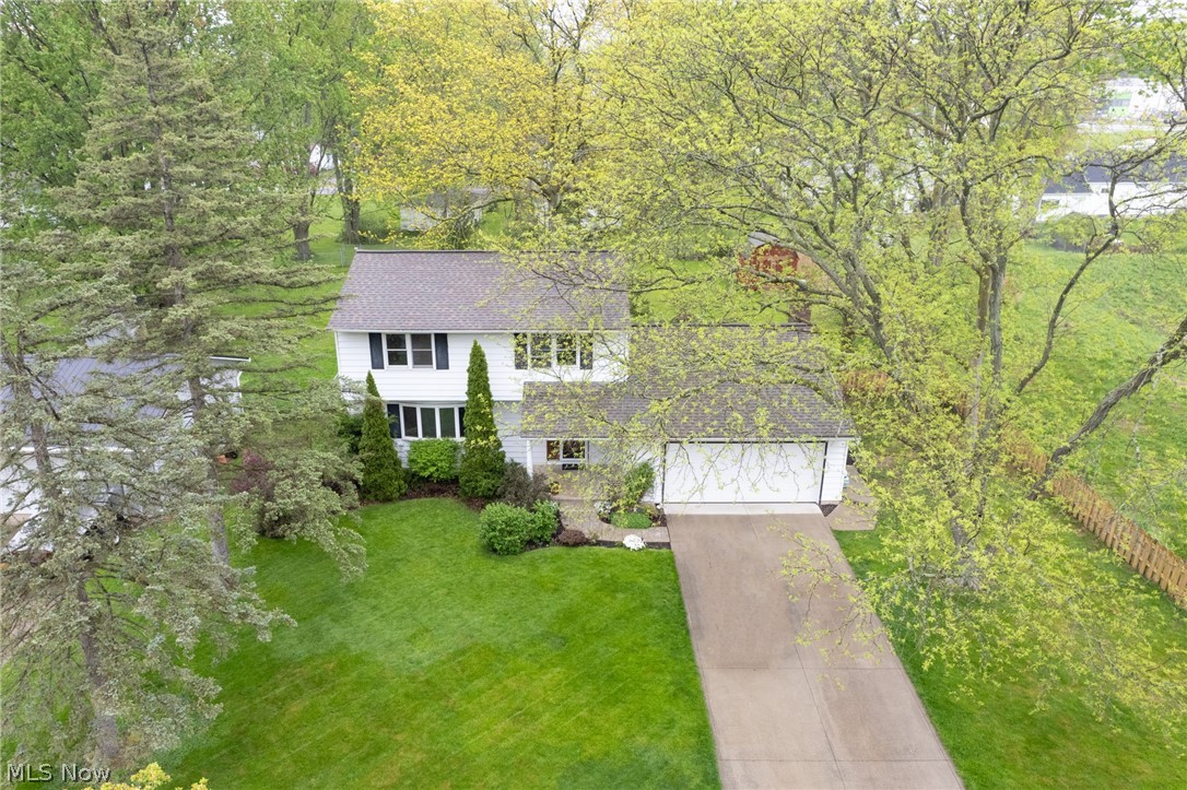 Home Sweet Home! This charming 3 bedroom colonial is nestled in the heart of North Ridgeville, offering the perfect blend of comfort and convenience. Situated on a sprawling large lot at the end of a peaceful cul de sac. Location is key, and this property delivers with close proximity to NR schools, shopping, dining, and easy access to I-480 and the turnpike, ensuring that every convenience is within reach. Step inside and feel the pride of ownership that permeates every corner of this home. The main level welcomes you with a spacious living room, formal dining room, and an inviting eat-in kitchen featuring upgraded cabinetry. Cozy up in the family room, complete with a wood-burning fireplace, perfect for chilly evenings. A convenient half bath adds to the functionality of the main level. Upstairs, discover two bedrooms, a full bathroom with a dual vanity and walk-in shower, and the owner's suite, boasting an attached, remodeled half bath. The basement offers versatile space that can be customized to suit your family's needs, whether it's additional living space, a home office, or a recreation room. Outside, the fenced backyard is a true oasis, featuring a stamped concrete patio and a newer shed for your lawn equipment. It's the perfect setting for entertaining guests or enjoying quiet evenings under the stars. With extensive updates and upgrades throughout, you'll have peace of mind knowing that this home has been meticulously cared for. Ask for the complete list of improvements! Don't miss out on this rare find! Schedule your private tour today!