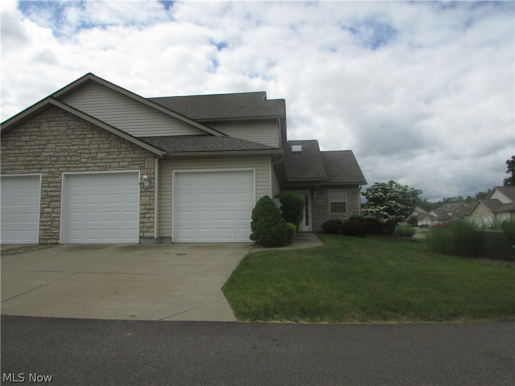 An excellent condo in Creekside of Pleasant Lakes. First floor living with a first floor bed and bath, as well as laundry. Each bedroom is spacious. The kitchen opens to the large great room with cathedral ceilings. There is a 2 car attached garage, patio, and so much more.