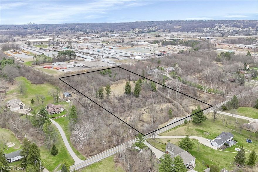 Set on nearly 8 wooded acres in North Royalton, this expansive parcel offers a rare blend of privacy, natural beauty, and everyday convenience. Tucked back from the road and surrounded by mature trees, the property creates a peaceful, secluded setting with the space to design a truly custom home. The visible clearing within the landscape and location of the former home, provides an ideal opportunity for a future homesite, while the surrounding woods offer seclusion and privacy. Nearby established homes add to the appeal, creating a sense of community while still allowing for a private retreat feel. Enjoy the best of both worlds—serene, nature-filled surroundings with quick access to shopping, dining, and major routes. Whether you’re envisioning a luxury estate or a quiet escape, this property offers the space, setting, and potential to bring your vision to life. Bring your own builder and explore the possibilities.