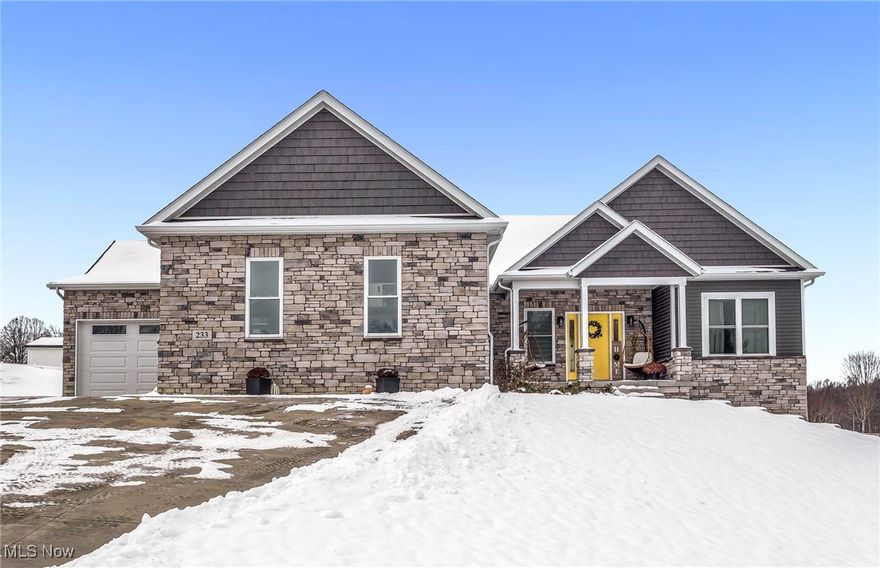 Move-in-ready ranch with a full finished walk-out lower level, offering exceptional flexibility and generous living space. This 3 bedroom/3 full bath home features an open main-level layout with 9-foot and vaulted ceilings, upgraded finishes throughout, and a private primary suite—all with convenient main-floor living.

The finished walk-out level functions as a true second living space with two bonus rooms, a full bath, and direct backyard access—ideal for guests, a home office, gym, or entertaining. Outdoor living is equally impressive with a covered deck, stamped concrete patio, and professionally landscaped yard accented with white beach rock.

Additional highlights include a 3-car garage with epoxy flooring, extra parking, and thoughtful upgrades throughout. Spacious, functional, and designed for everyday living, this home offers a rare combination of comfort, flexibility, and value.

America's Preferred Home Warranty is included.