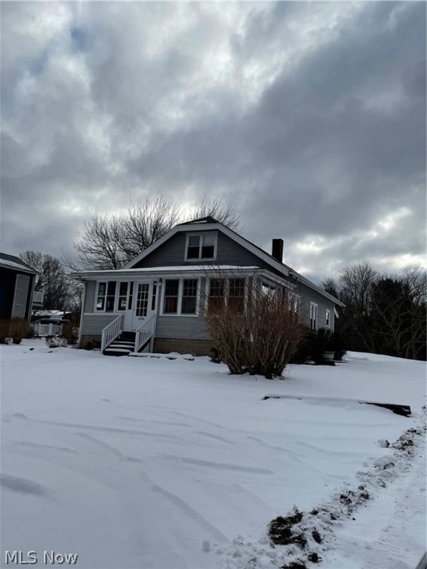 Don't pass this one up.  It's a lot bigger inside than it looks from the outside.  1571 Sq ft total plus a nice basement with new glass windows.  This home has been up-dated thru-out including a new complete kitchen with new stove, fridge and dishwasher and a new full bathroom which includes built in's.  Enjoy the large dining area plus a large living room and a beautiful office/den area with spectacular french doors.  There is a huge bedroom upstairs with painted wood floors and lots of storage.   The main level boasts beautiful oak hardwood floors thru-out except kitchen, bathroom and rear entry.  You will love the lay-out on this beautiful home.  This is move in ready.  There is a 2 car garage and paved drive way.  Ready for a new family.  Priced to sell.