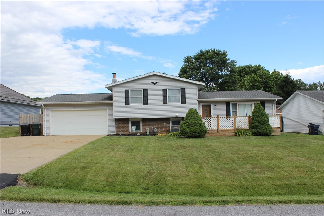 You'll want to dive right in and see this lovely, move-in ready home so you can enjoy your inground pool this summer! This well maintained Perry split level has been very loved by the original family and includes a newer roof, electric box, & water heater. Enjoy the neighborhood happenings on your front Deck. The fenced backyard features a 36 x 18 inground pool, a 16 x 10 shed, and plenty of backyard space to play in and enjoy. The updated Kitchen features oak cabinets, nice tile backsplash & countertops w/appliances. Open LR/DR area has nice carpeting with hardwood floors underneath. DR has a slider that walks out onto the rear Screened Porch, a perfect spot to enjoy the summer breezes, set up a Patio table for meals, and cool off in the shade after stepping out of the pool. Oak woodwork, trim, and solid oak doors grace the interior. Upstairs, sparkling main bathroom & 3 nice Bedrooms, also w/hardwood under carpets. You'll enjoy the attractive Family Room w/woodburner, and a bonus room near the Laundry area. Garage is sure to be a man-cave lovers dream, heated and insulated with gas heater & woodburner. The backyard is very well maintained and the pool is open and ready to enjoy! Extra parking spot in the driveway too. Located in a wonderful family-friendly neighborhood in the heart of Perry. 1 year Home Warranty is included.