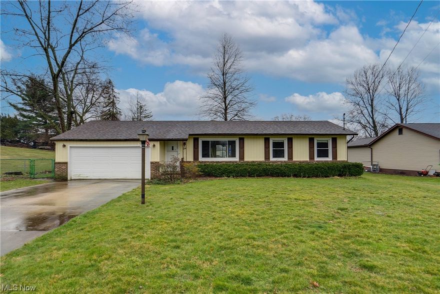 Check out this fantastic 3 bdrm, 2 full bath ranch home nestled in the beautiful and quiet Munroe Falls. This 1984 built home offers a wonderful layout comprised of a large living room with picture window, a formal dining area, and a roomy kitchen that opens to a large family room. Down the hall are 3 good sized bedrooms and a full bath. There are 2 sliding doors, one from the dining area and one from the family room, which access the enormous and fully fenced back yard. The lower level offers loads of finishable space with an additional full bath already in place. Such a great home that offers so much potential and opportunity for the next owner to imprint their touch and style upon! Seller including first year of home warranty for the buyer! Schedule your showing today!