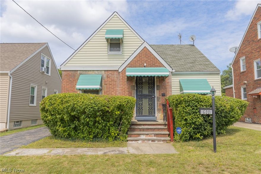 Welcome to this cozy 3 bed 1.5 bath bungalow in Cleveland! This home features plenty of living space, beautiful faux fireplace in the living room, a dining area with custom built-ins, and natural light throughout! Off the back of the house there is a porch overlooking the backyard, perfect for entertaining friends and family or just relaxing. There is also a detached 1-car garage and additional outdoor parking space. Updates include new electrical & new roof on garage. Schedule a showing today!

Co-listing agent is related to seller.