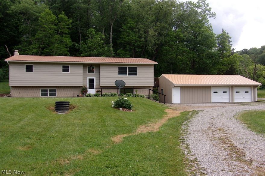 Country delight awaits on 2.173 acres! Lovely bi-level with many updates! Home features many beautiful improvements, it's a three bedroom and 2 full new baths. Large updated eat-in kitchen, opening into oversized living room, basement features big new family room with new full bath and laundry. Four car detached garage, lovely deck overlooks the woods! Handicapped accessible. Come enjoy this country setting.