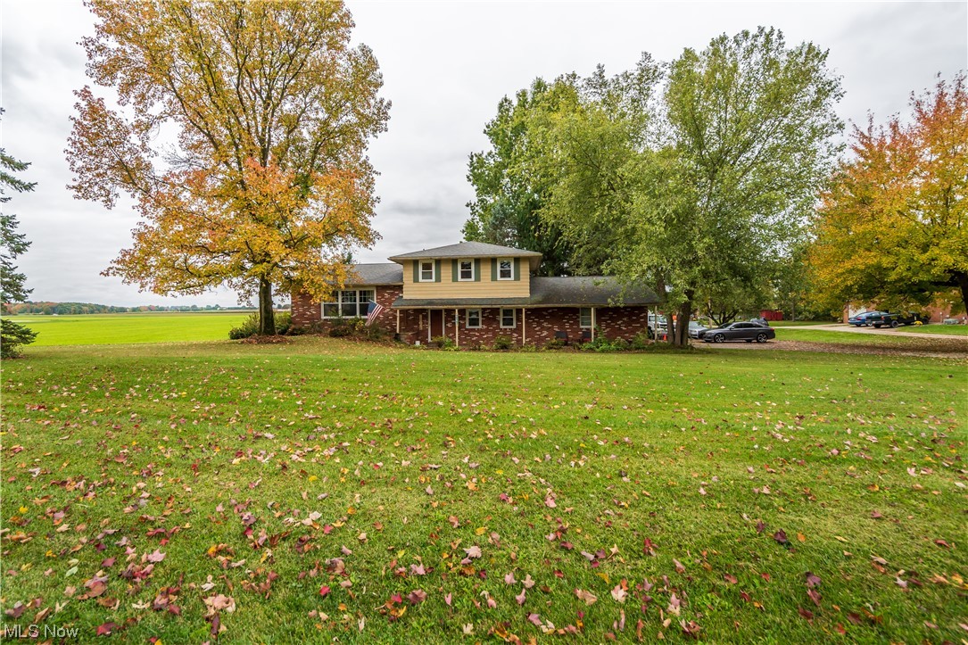 Welcome to your new home in the heart of Rittman! This delightful split-level home offers a perfect blend of modern comfort and country charm on a generous 2-acre lot. Step inside to discover a spacious living area, where new windows offer plenty of natural light. This home features four bedrooms and two full baths and two living areas, giving plenty of space. The attached two car garage leads into the second living area that also has a bedroom off to the side and your laundry as well. Schedule your private showing today !