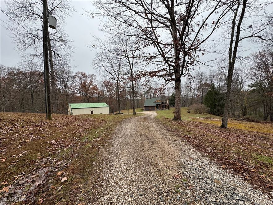 Beautiful three bedroom, two full bath cedar home sitting on 25+ acres! Two car attached garage. Basement Rec room, large storage room. Vaulted Living room, wood ceiling with abundant natural light and Gorgeous stone WB fireplace! Hardwoods, carpet, tile. Two first floor bedrooms with full bathroom in the hallway. Second floor owner suite, private full bath, large walk-in closet, hallway reading nook, and a balcony! Rear covered deck leads to a fenced yard. The private setting offers mature trees and a fenced rear yard. 
**A 28 x 40 pole building featuring new stalls and new fencing enclosing 1.75 acres for your farm animals! Roof is approximately 7 years old and central air is 1 1/2 yrs old. Public water, septic, AEP electric, Rumpke trash and CAS Cable fiber optic internet or Frontier. Approximately 30 minutes/- to Nucor Steel in Apple Grove, WV, Constellium in Ravenswood, WV, Gallipolis, Ohio.