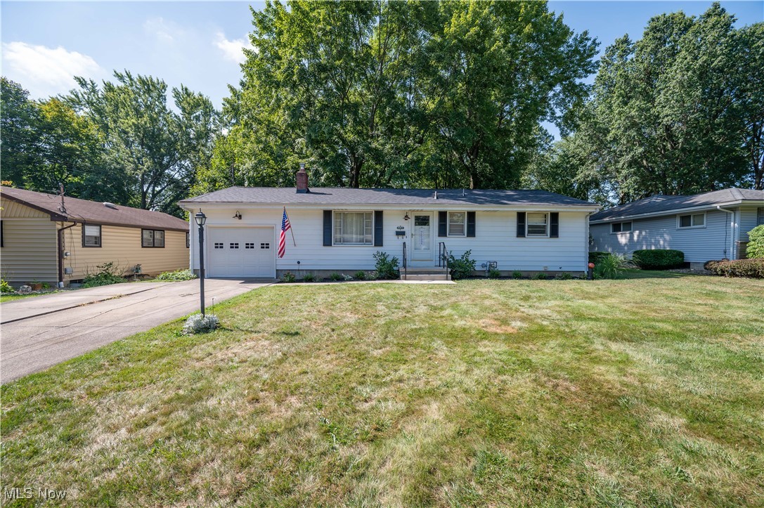 Looking for an excellent ranch with neat and tidy exterior, aluminum siding and attached garage? How about a freshly painted interior with hardwood floors and a great blend of retro chic vintage elements and modern finishes. Welcoming living room with lots of natural light from the large picture window. Mounted tv to stay for the new owner! Original kitchen is well kept with the classic oval edged countertop and there is a spacious dinette for your meals. Three nice sized bedrooms, all with great closet space and a full bath that has the right blend of updated with the original ceramic tile. HUGE Basement with a pool table, rec area, laundry room and extra stove & fridge can stay if you like! This home still has some of the original characteristics including the retro radio and record player build ins, plus a sewing machine in the laundry room with washer and dryer to stay. Gas forced air furnace and Central air for keeping cool on those hot afternoons. Whole house attic fan as well. One of the largest lots on the street, wait until you take in this awesome backyard! This house is topped with a brand new roof in 2025! Call today to see this wonderful find in Austintown!