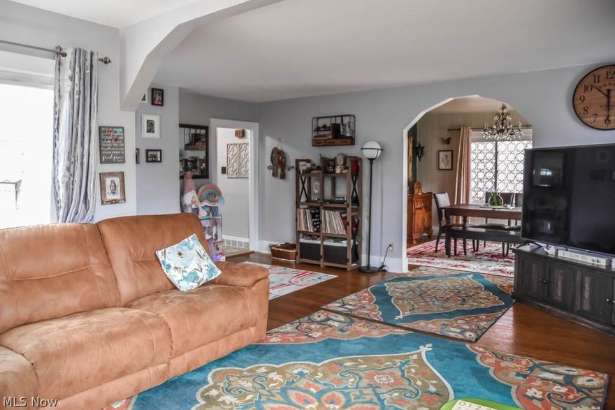 Affordable 3 bedroom colonial in Goodyear Heights!  Step inside to the sun filled living room with hardwood floors and an archway that leads into the formal dining room. The fully applianced kitchen has a great layout with tons of cabinet space and a ceramic tile backsplash. Upstairs, there are 3 nice sized bedrooms with hardwood floors and a full bath.  The finished lower level rec room adds even more living space plus another full bath with a shower.  Outside, you'll enjoy the covered patio and fully fenced backyard with service door access to the 2 car garage.  Updates include a newer roof, A/C, replacement windows, upstairs toilet, dishwasher and backsplash.  This home is delightful and move-in ready so don't wait to schedule your showing!