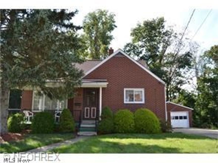 4 BEDROOM BRICK CAPE COD WITH 2 CAR DETACHED GARAGE SITS ON A DOUBLE LOT.SELLER SAYS HARD WOOD FLOORS. UPDATED KITCHEN , RECROOM IN BASEMENT WITH WOOD BURNING FIREPLACE.  UPDATES ARE: ROOF 10 YRS , GARAGE ROOF 3YRS, FURNACE 15YRS.