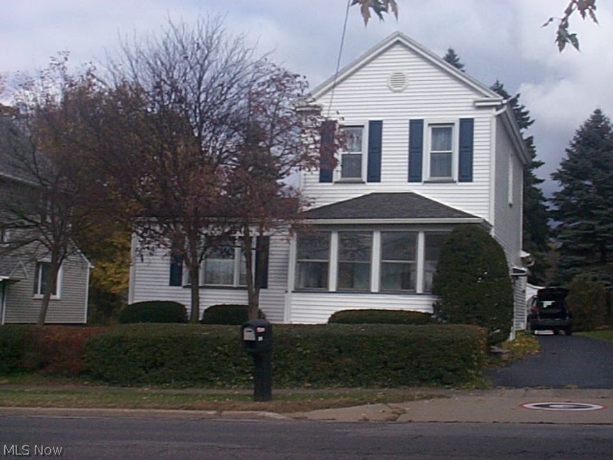 Vinyl sided, three bedroom home ,  with first floor bedroom and first floor handicap bath. Double lot, garage with opener, enclosed front porch/sun area.