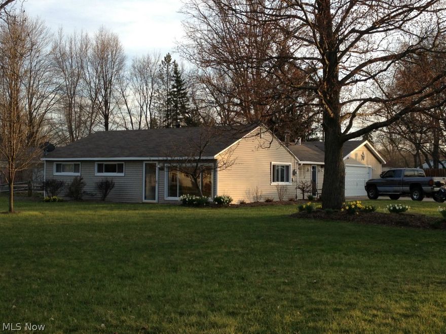 **Open June 1  1:00-3:00**Fabulous ranch home updated from top to bottom! Stunning decor and impeccably maintained! 1460 square feet! 3 bedrooms and 2 full baths! Updates include roof, furnace, central air, siding, additional tankless h20, electrical panel, windows, slider and exterior doors, double wide driveway, stamped patio, 30x29 garage addition including vaulted laundry room and newer full bath with skylight , R30 attic insulation, total kitchen with built in appliances and ceramic counters, decor throughout including laminate flooring, carpeting, ceramic and more! Newer woodburning stove and all appliances stay as well! Beautiful lot with a private fenced backyard, stamped patio & walkways and large shade trees! An absolute must see!