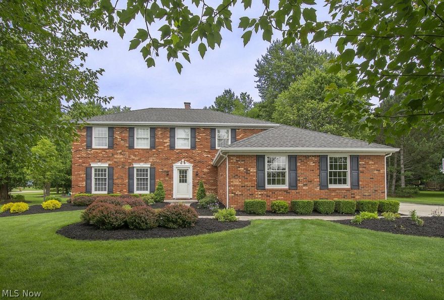WOW! This stately brick-front Colonial has amazing curb appeal and a freshly updated "Pottery Barn" interior, all nestled on a lush professionally landscaped lot.  The updated island Kitchen is the heart of this home, opening to a cozy wood-beamed Family Room and an incredible 4-season Sunroom.  Spacious formal Living Room and Dining Room, and a perfectly located Study complete the first floor.  Upstairs you will find four generously sized Bedrooms, a dual sink family Bath and a sumptuous updated Master Bath.  Take the celebration outdoors and enjoy your oversized stamped concrete patio complete with firepit, or relax on the inviting covered Porch - both accessible from the Sunroom.  Major improvements include new roof, HVAC, Pella windows, hot water tank, driveway, hardwood flooring, trim, and upgraded interior doors throughout.  This home is truly move-in ready.  Desirable neighborhood in the award-winning Brecksville/Broadview Heights School District.  Welcome Home!