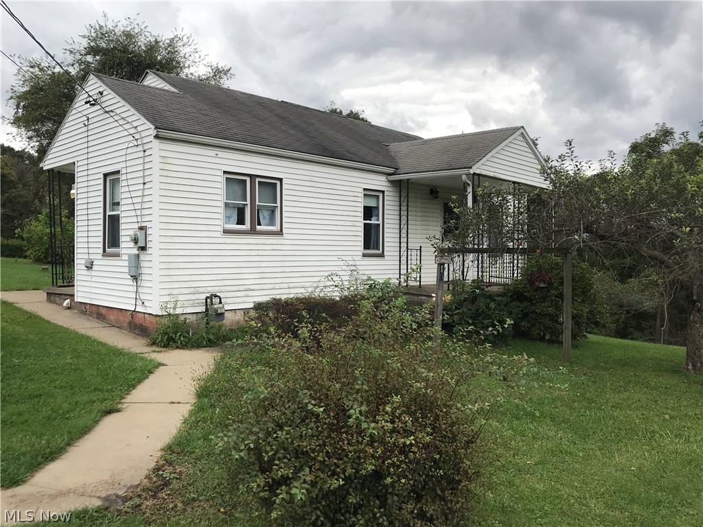 INVESTOR or just starting out, this 2 bedroom ranch won't last long. Home features vinyl siding, replacement windows, 15 year old roof, newer hot water tank, and nice large flat triple lot measuring almost 1/2 acre. Call today