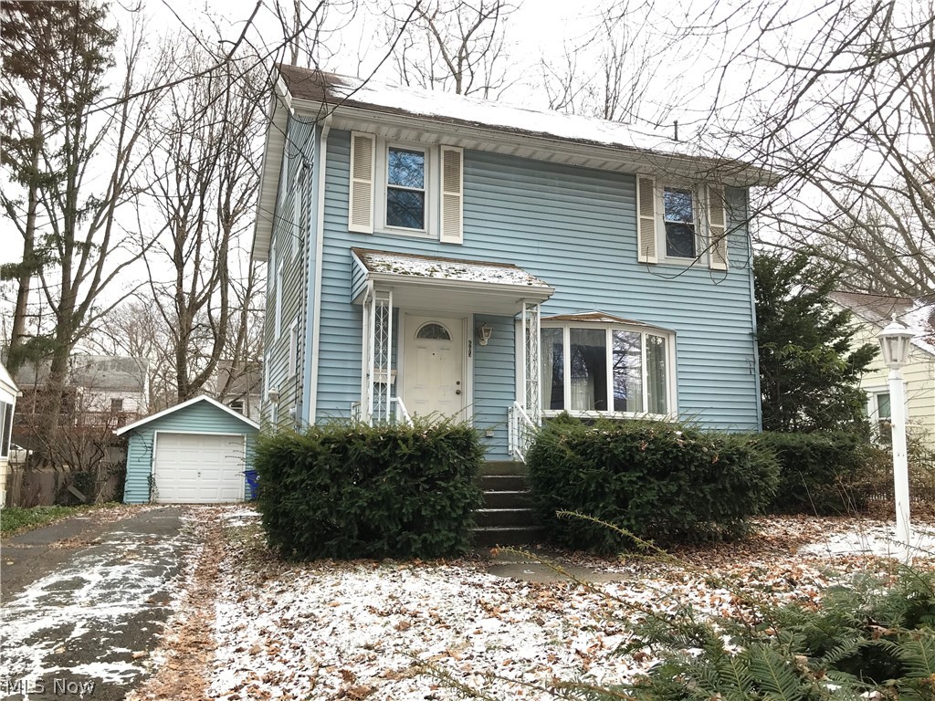 Are you looking in Kent, Ohio within walking distance of the lively downtown or Kent State University? Are you willing to put in some sweat equity and use some elbow grease? Is Original hardwood and established neighborhood important to you? Then this doesn't have to be the fish that gets away! This 4-Bedroom Colonial boasts a first floor bedroom w/ ensuite full bath, both added to the property in 1991. *This fourth bedroom could also be used as a family room with its cast iron gas stove. The living room boasts original fireplace; dining has a portable electric fireplace unit that fits the space nicely. There's a deck accessible from both dining and first floor bedroom sliders. Downstairs bath is newer construction and upstairs bath has been overhauled, primarily with ceramic tile. Original wood floors in Dining, Living and 3 upstairs rooms. Attic Bonus Room could be used as fifth bedroom but would require escape ladder per fire code. Perfect for the first-time buyer who wants to impro