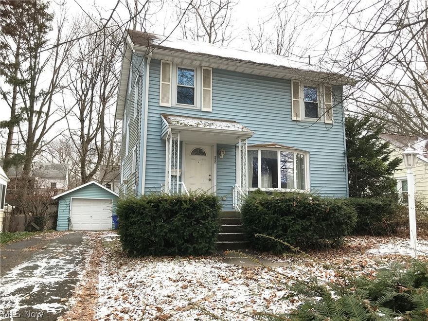 Are you looking in Kent, Ohio within walking distance of the lively downtown or Kent State University? Are you willing to put in some sweat equity and use some elbow grease? Is Original hardwood and established neighborhood important to you? Then this doesn't have to be the fish that gets away! This 4-Bedroom Colonial boasts a first floor bedroom w/ ensuite full bath, both added to the property in 1991. *This fourth bedroom could also be used as a family room with its cast iron gas stove. The living room boasts original fireplace; dining has a portable electric fireplace unit that fits the space nicely. There's a deck accessible from both dining and first floor bedroom sliders. Downstairs bath is newer construction and upstairs bath has been overhauled, primarily with ceramic tile. Original wood floors in Dining, Living and 3 upstairs rooms. Attic Bonus Room could be used as fifth bedroom but would require escape ladder per fire code. Perfect for the first-time buyer who wants to impro