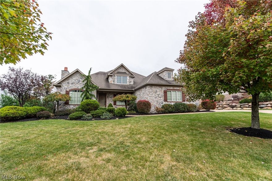 This home has everything you're looking for...former model by Legacy Homes has the space for a family who loves to entertain.  As you step into the foyer with wood floors, you will find to your left a beautiful office with built-ins and a fireplace, to the right is a formal dining room, the 2 story great room will please everyone with the double sided fireplace and large windows to allow the natural light.  The spacious kitchen offers the other side of the fireplace, eating area, island, custom cherry cabinets, granite counters and stainless appliances.  Just off of the kitchen is the first floor laundry and a half bath.  To finish off the first floor is a wonderful first floor master suite with a Jacuzzi tub, shower and walk in closet.  Upstairs is a Jr Suite with a bath and walk in closet, the 3rd bedroom offers an entrance to the other full bath, and there's another roomy 4th bedroom.  Downstairs you will love to entertain family and friends in the large family room, complete with a