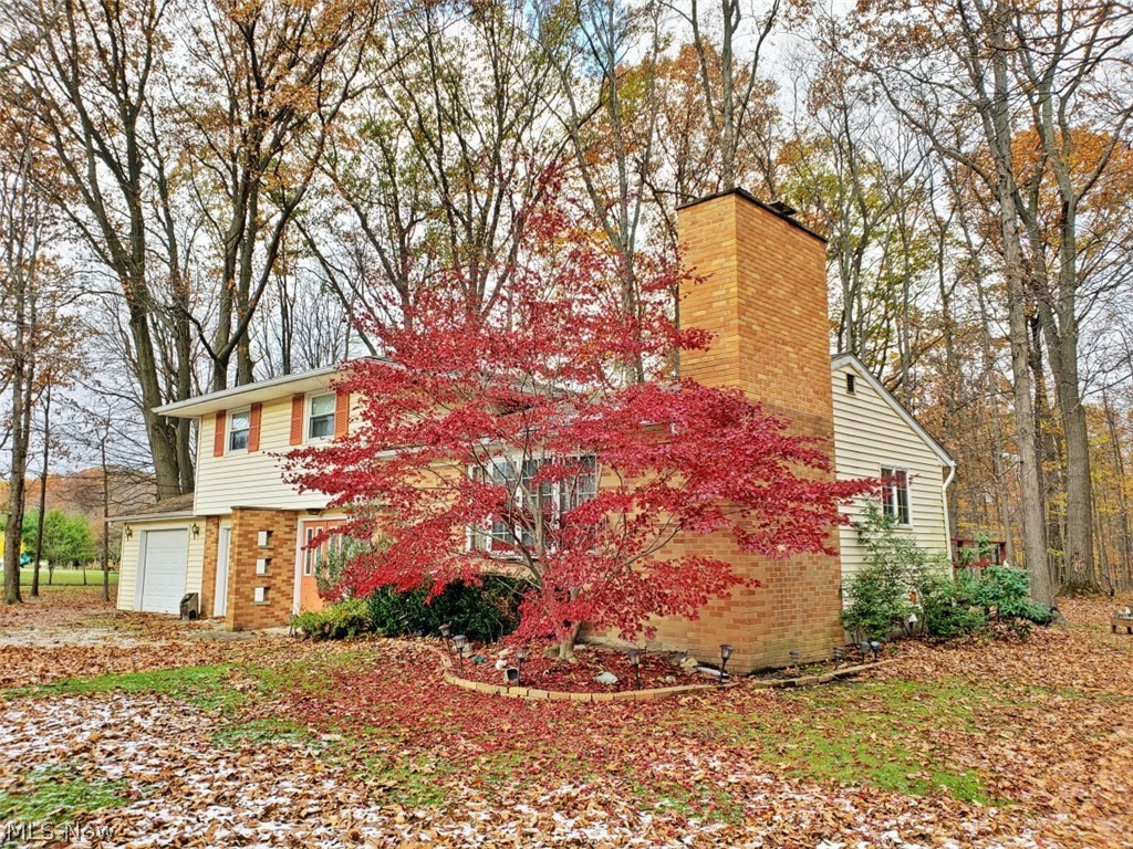 First time on the market in 50 years! Quaint split level on a 1 acre wooded lot. Flowing layout, well kept but bring your decorating ideas. Nice built ins. Deck in the back for summer fun and a wood burning fireplace for those cold winter months. Gorgeous hardwood floors in all three bedrooms. Must see!