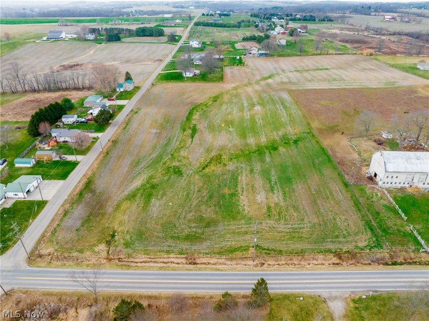 LIVE ONSITE AUCTION- Tuesday, May 5th at 6:00 PM
Parcel 2: 5 acres – 950’ road frontage – flat, open building lot