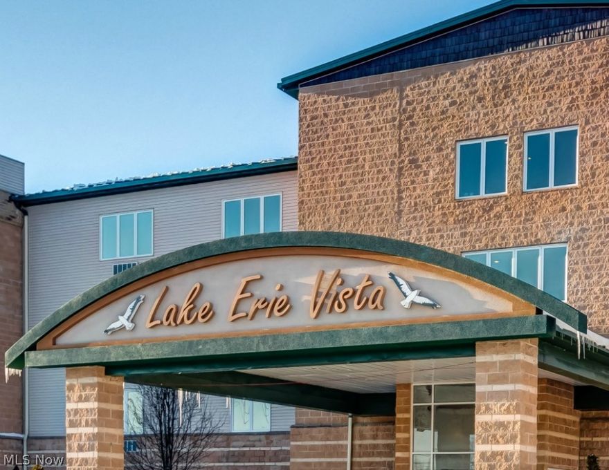 PHENOMENAL Price!! Welcome to this gorgeous 2 Bedroom 2 Bath condo in Lake Erie Vista -- a luxury waterfront condominium complex in Geneva on the Lake on the shores of Lake Erie. Lake Erie Vista Condominiums consist of 47 luxury units within a single 5-story, 2-elevator-serviced building that is oriented toward a private beach along Lake Erie. Common area amenities include a heated indoor pool for year round use regardless of weather, exercise area, & gathering room. Built in 2009, this 1242 sq ft unit has spectacular views, secured access, beautiful bamboo floors, an open floor plan, ceiling fans, & soft neutral decor. The living room is open to the dining room & kitchen. It has sliding glass doors to the balcony deck. The formal dining room looks out onto the lake as does the kitchen and living room. The kitchen has granite countertops, a breakfast bar, glass tile backsplash, maple cabinets, crown moldings, pendant lights, & stainless steel appliances (electric range, refrigerator wi