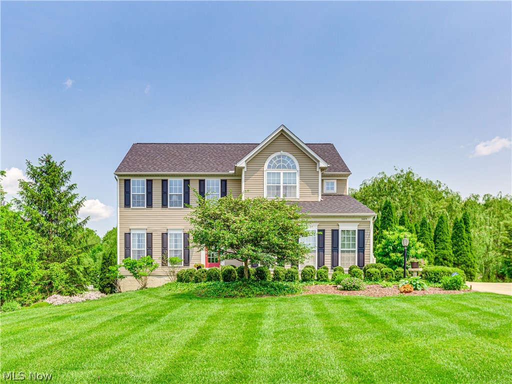 Impressive Colonial in beautiful Blossom Glenn. Upon entering you will immediately appreciate the attention to detail in the most up-to-date color pallete, and lighting fixtures. Featuring 4 bedrooms, 2 full 1 half baths and an awesome finished lower level this incredible open floor plan includes an updated kitchen with white cabinetry, granite counter tops, stainless steel appliances, prep sink, and a sizable island. The sundrenched morning room overlooks a magnificent view of the park-like yard. The great room includes a charming brick fireplace. A formal living room and convenient first floor laundry completes the first floor. The master bedroom includes a sitting area, massive walk-in closet, and ensuite bath. Three other bedrooms are also nicely sized and all have substantial closet space. The main bath completes the second floor. A finished lower level offers a rec room, office, and is plumbed for an additional bath. The roof was recently replaced. A one year home warranty i
