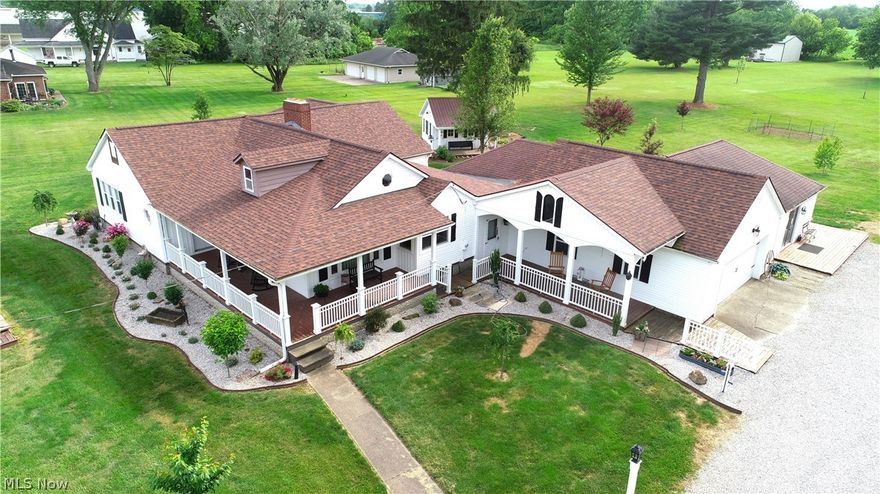 WOW! The largest 2 BR home in Mount Vernon! You want space to entertain outside? OR Want to operate a business or store from your home? 3-4 Covered porches (2 which could easily be screened in), 2 open decks & a she-shed or grand kids getaway...and a 32x60 detached garage. Plenty of room for cars, trucks & big toys. This classic ranch has 2435 first-floor square feet PLUS a finished lower level, four gas log fireplaces, 2-4 family or bonus rooms. Presently only 2 bedrooms/2 full baths, but the possibilities to convert other rooms to bedrooms or even Air bnb-type guest quarters are vast. Located on the south side of Mount Vernon on 2.1 Acres, across from MVNU campus athletics & just 30 minutes from Intel and related businesses. Video Walk-Thru Links Available. Immediate posession...Have dogs? Invisible fence in front and back yards. 
The community of Mount Vernon has so much to offer! Great parks, schools, miles of hiking biking trails, kayaking/canoeing, farmers market, fine restaurants, pubs, live theater, rich cultural and historic heritage. Home to three colleges and close to all the action in greater Columbus market…but far enough away not to be ruined by it. Named by Ohio Magazine as One of Ohio’s Best Hometowns, in 2017. Named #37 Hottest Zip Codes for Real Estate in the Nation in 2022. Located within a half hour of new Intel plant. More info and dozens of links of amenities and things to do in Mount Vernon and surrounding area available.