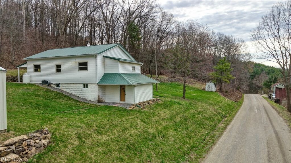 Photo of 12413 Lick Run RD RD, Newcomerstown, OH 43832 (MLS # 5212687)