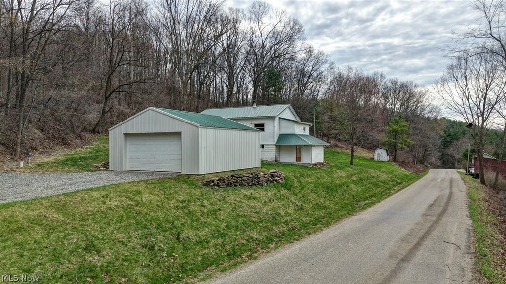 Photo of 12413 Lick Run RD RD, Newcomerstown, OH 43832 (MLS # 5212687)