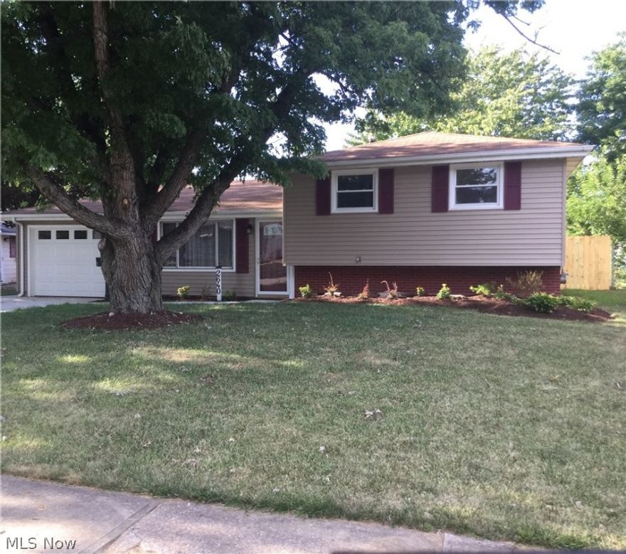 Super gorgeous split situated on a large lot in a great neighborhood.  Four bedrooms, large fenced backyard with plenty of room for the kids.  This is a turn-key home, with an approved Point of Sale!  NEW: vinyl siding, concrete driveway, patio, sidewalks and central air!  Someone will be very happy to call this newly rehabbed property HOME!