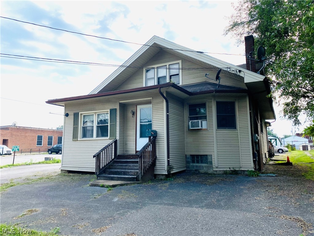 Awesome, well taken care of fully-rented Hubbard duplex that has served it’s purpose throughout the years and owner is ready to retire. This is selling as a package along with 51 Mackey, which is also a duplex, & located diagonally across the street. You will love the convenience of having both of your investment properties super close to each other for easy maintenance and showings for re-renting etc. Your tenants will love the convenience in being close to downtown and able to simply walk to the dollar stores or any hair salons etc. This unit is located right behind the Hubbard post office! The tenants will also love the huge paved parking lot in the back so there is never an issue with parking or having the other tenants complaining while they having a get together or family birthday party. This should never happen with the amount of parking you have at this unit! One of the major problems...PARKING....solved immediately! The downstairs unit has two bedrooms and brings in $650 pe