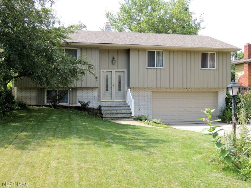 Spectacular Deal! Very Open & Vaulted Floor Plan! Backs to Wooded Area W Stamped Concrete Walkways to Patio And Massive 20x16 Deck! Newly Installed Roof & Gutters! All New Kitchen w/Cherry Stained Maple Cabinets & Rock-On Counters! Stainless Appliances Included! Built-In Dinette Table! Solid 3/4 Inch Hickory Hardwood Flooring Kitchen, Living Rm & Hallway! Newer Carpet in Bedrooms. Family Room W/ Brick Hearth Woodburning Fireplace! Also, NEW Windows, Central Air Conditioning, Light Fixtures, & Interior Doors & More! Both Baths all NEW Ceramic Tiled Baths, Vanities, Sinks, Faucets! Part of the Eagle Oaks HOA with Community Swimming Pool! Schedule To See Today, Won't Last Long!