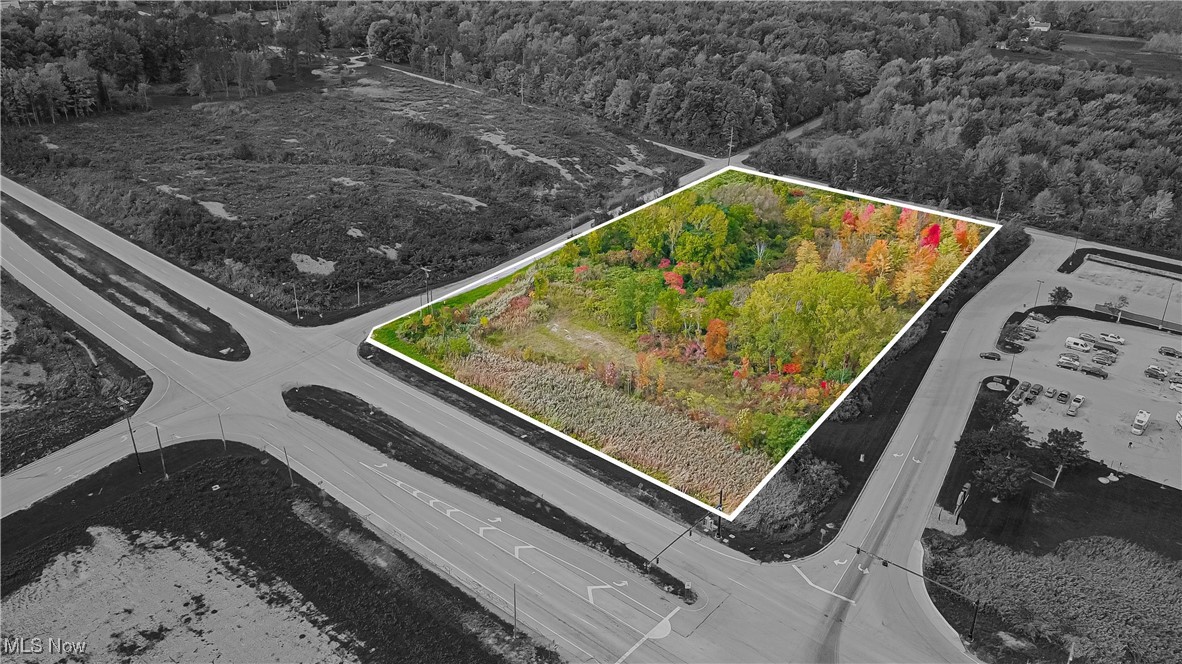 Prime Commercial Land located near I-90 interchange on Route 7 in Conneaut, OH! This is a corner lot with 5+ acres zoned B-1, Highway Service Business District. I-90 Exit 241 has seen substantial development over the past few years, including a Love's Travel Stop, McDonald's, Subway, Truck World, and Burger King. This site would be a great opportunity for various interstate commercial uses, especially a restaurant or hotel. There's approximately 371 ft of frontage on Route 7, about 665 ft on West Under Ridge Road, Loves Drive on the other side, and the back of the property has 381 ft on Center Rd. Great accessibility and visibility. A Wetlands Delineation was completed along with a Jurisdictional Determination, to get any potential buyer one step closer to determining if this would be a good development opportunity for them. The center of the property, with road access, approximately 2.36 Acres, is all usable without the need for a wetland permit or mitigation. In addition, the wetlands that were identified have also been reviewed by the Buffalo District of the Army Corps of Engineers. Based on the Preliminary Jurisdictional Determination, provided upon request, conditions exist to obtain a permit to impact a portion of the wetlands (if desired). Restricted uses: retail convenience store, truck stop, gas station, fuel processing, wholesale, distribution, or any combination of those.